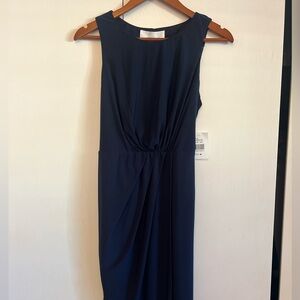Super flattering SuperFoxx Navy dress! Never worn, tags on!